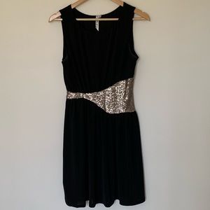 Black dress with gold sequins waist detail